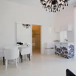 Collins Center Апартаменты *